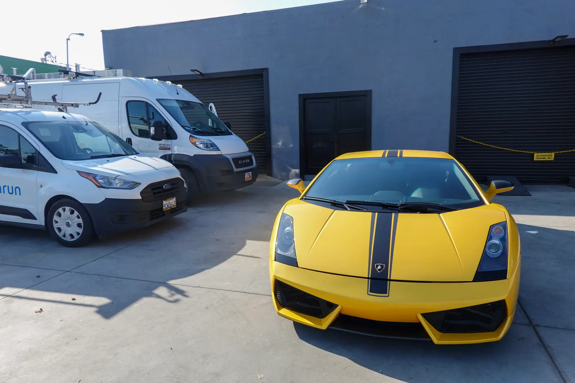 Yellow Lamborghini sports car parked at CenCal Auto Repair in Fresno, CA representing high-end vehicle care
