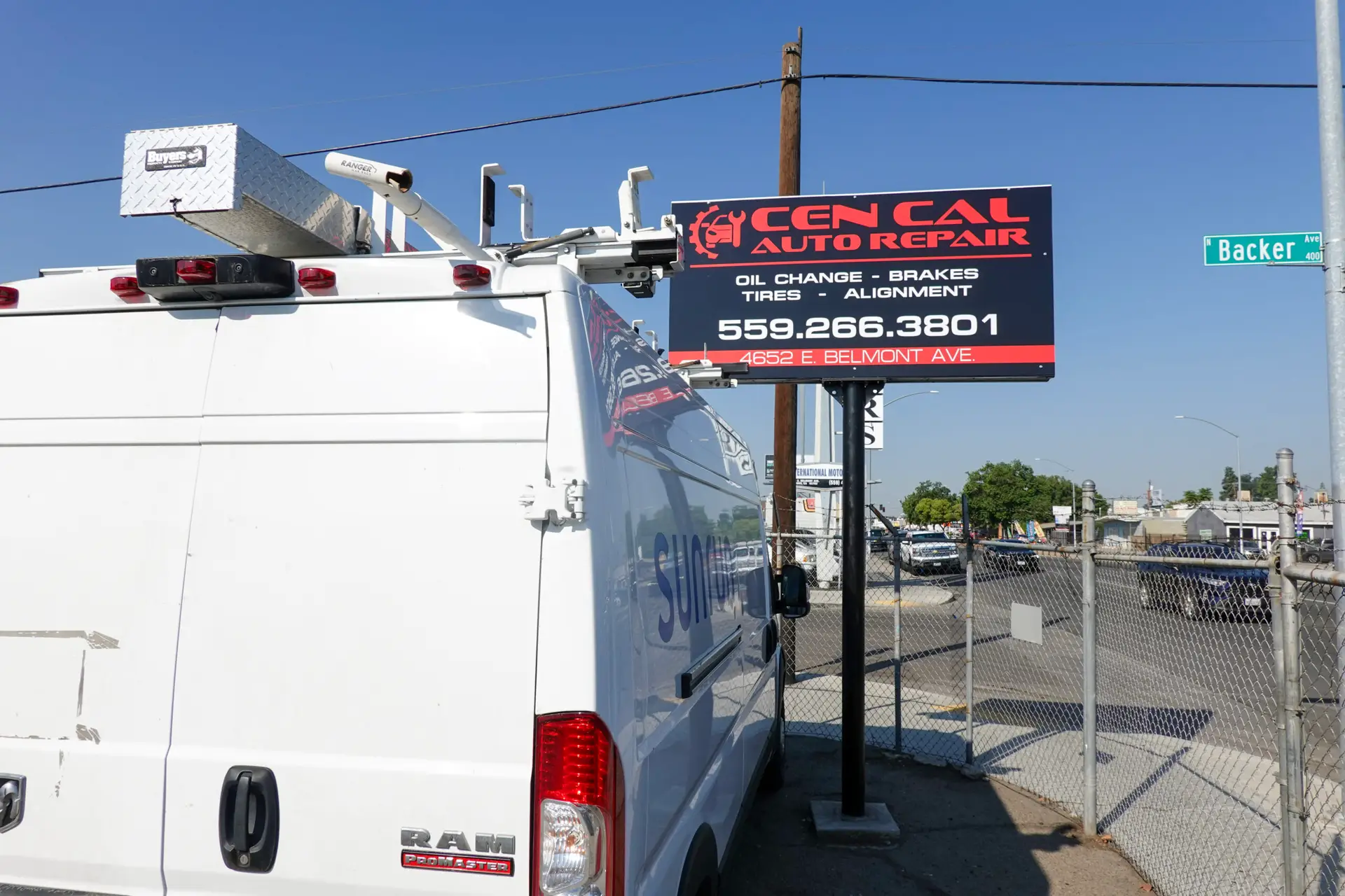 CenCal Auto Repair service van with billboard sign in Fresno, CA, showcasing fleet maintenance services